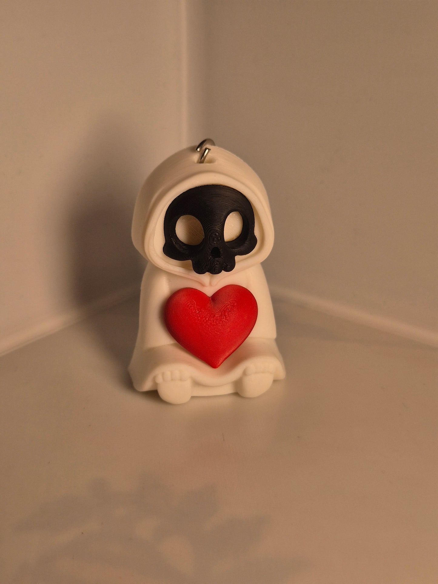 Grim Heart Keeper Keychain