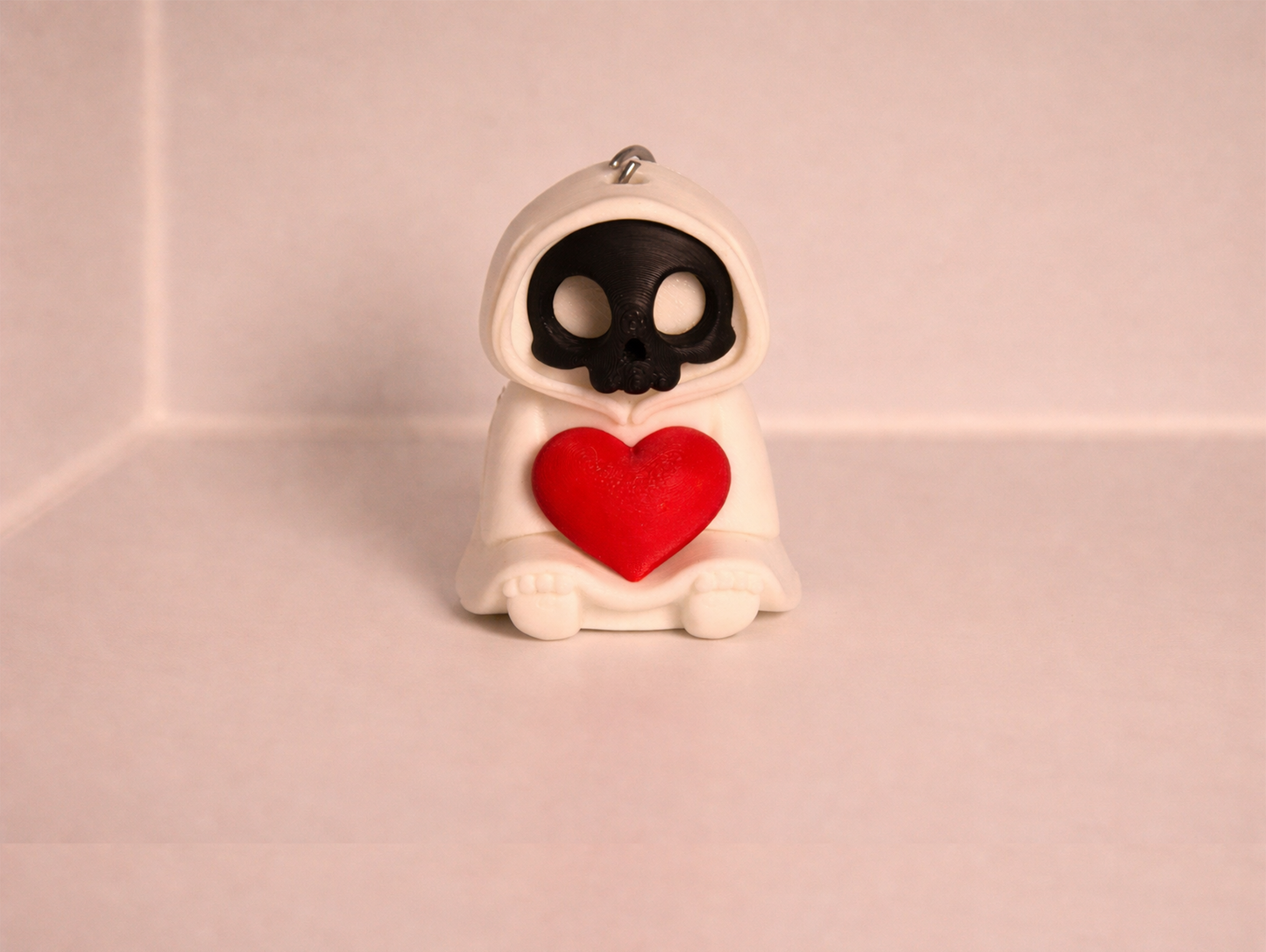 Grim Heart Keeper Keychain